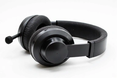 Sleek gaming headset with cushioned earcups and a retractable microphone